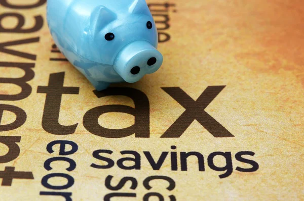 Piggy bank and tax concept — Stock Photo, Image