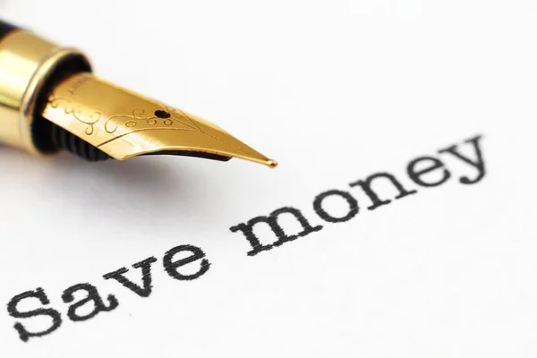 Fountain pen on save money text — Stock Photo, Image
