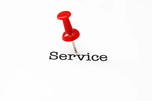 Push pin on service text — Stock Photo, Image