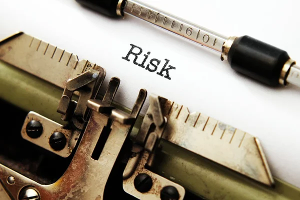 Risk text på skrivmaskin — Stockfoto