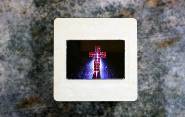 Croce su pellicola diapositiva — Foto Stock
