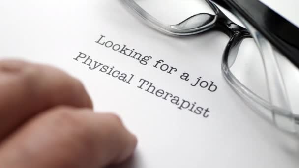 Finger tapping on physical therapist job form — Wideo stockowe