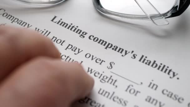 Finger tapping on limiting company liability — Stockvideo