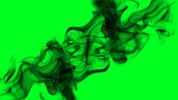 Zwarte rook op groen scherm — Stockvideo