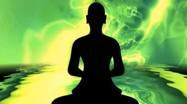 Meditasyondaki Budist keşiş enerji arka planına karşı poz veriyor