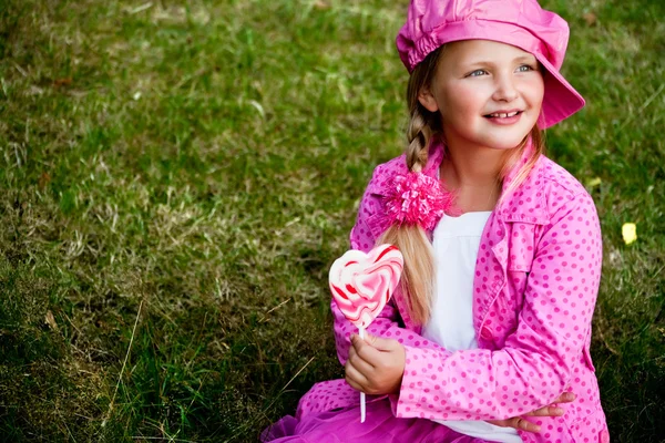 Roztomilá holčička s lolly — Stock fotografie