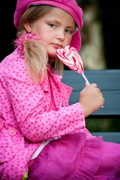 Arogant looking pink child — Stock Photo, Image