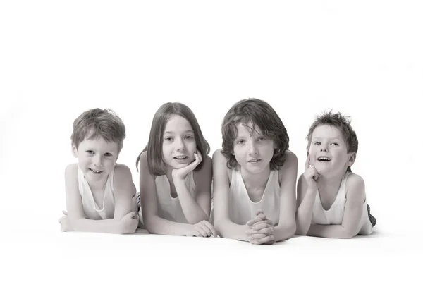 4 niños en blanco — Foto de Stock