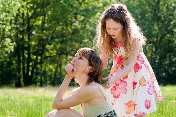 Playing the hair stylist — Stock Photo, Image