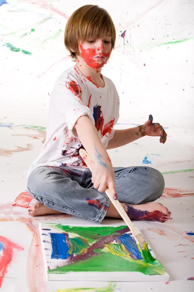 Drawning with a paint-brush — Stock Photo, Image