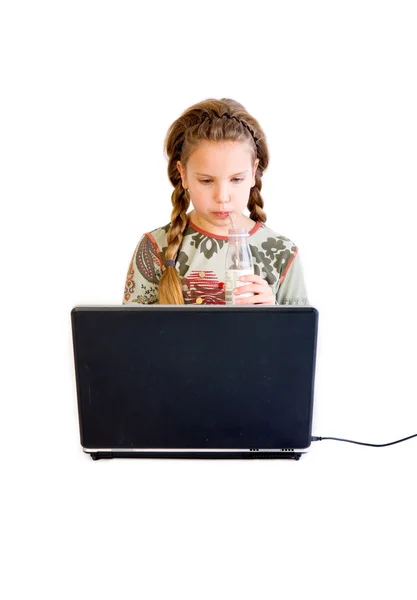 Blond child with notebook drinking — Stock Photo, Image