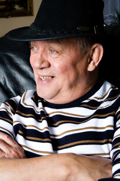 Grandfather with a black cowboy hat posing — Stock Photo, Image