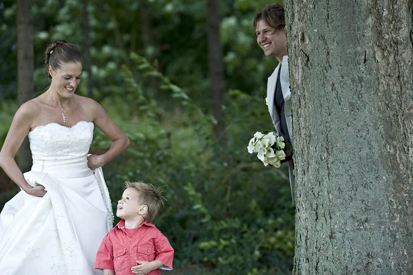 Groom playing hide and seek with his son — Stock Photo, Image