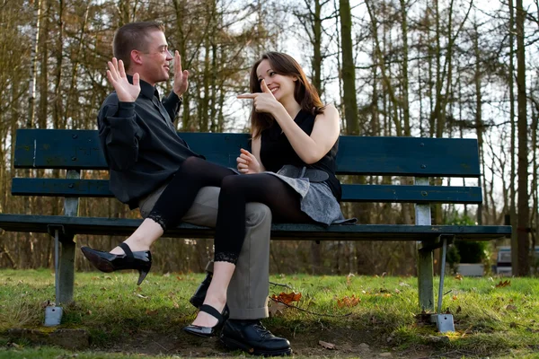 Young couple pointing — Stock Photo, Image