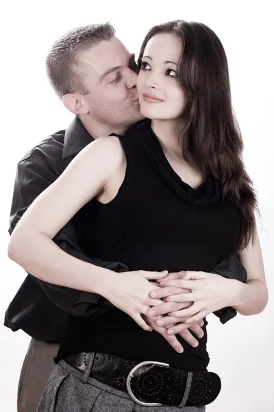 Man is kissing his girlfriend — Stock Photo, Image