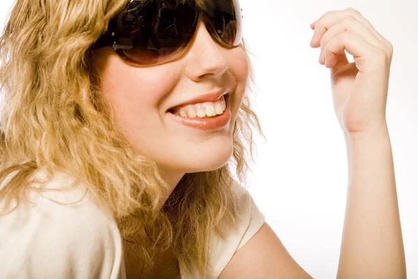 Portrait of a laughing blond curly woman Royalty Free Stock Images