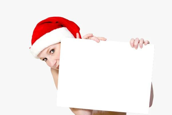 圣诞女孩举起一个白色标志为 copyspace — 图库照片