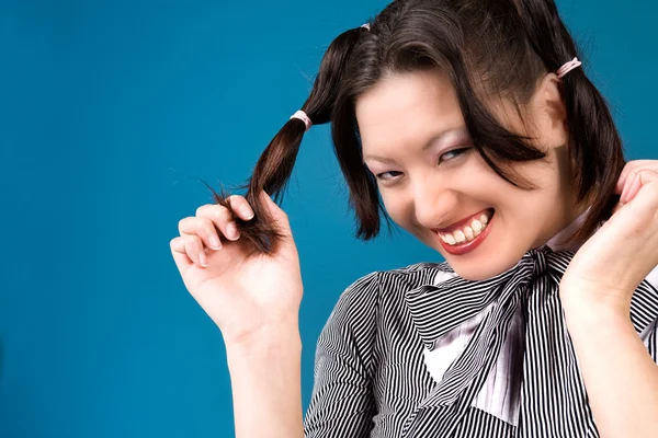 Grinst mit meinen Pferdeschwänzen — Stockfoto