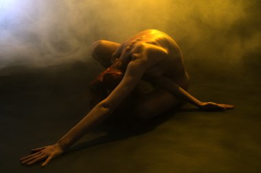 Yoga Nude in yellow smoke