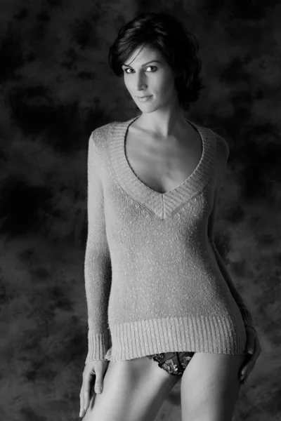 Tall brunette in sweater only — Stock Photo, Image