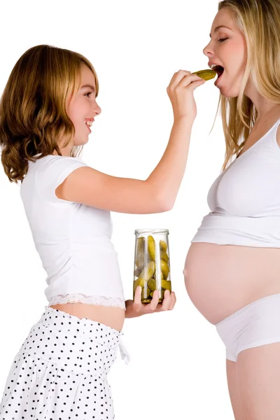 Feeding my pregnant aunt some pickles — Stock Photo, Image