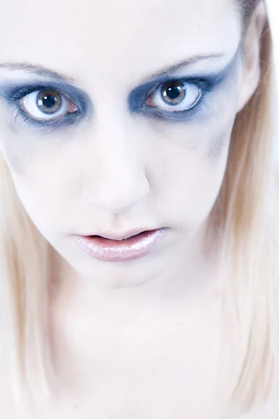 Studio portrait of a young blond woman looking scary — Stock Photo, Image