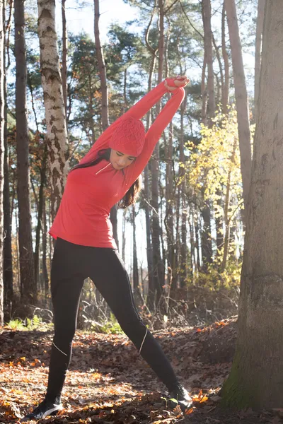 Stretching in the forest — Stock Photo, Image