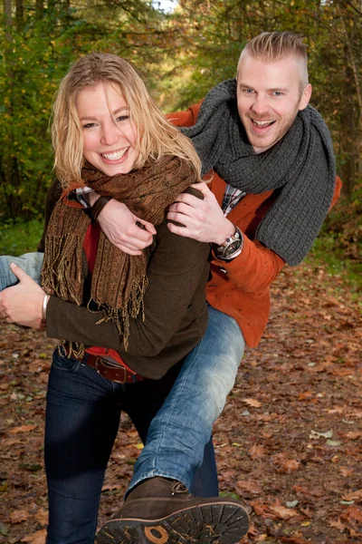 Couple is having fun while it's raining — Stock Photo, Image