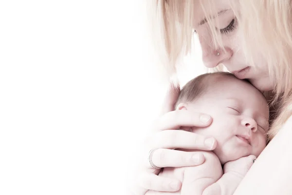 Mothers face and her little child — Stock Photo, Image