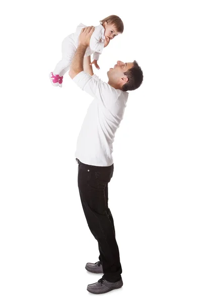 Father holding small baby aloft Stock Picture