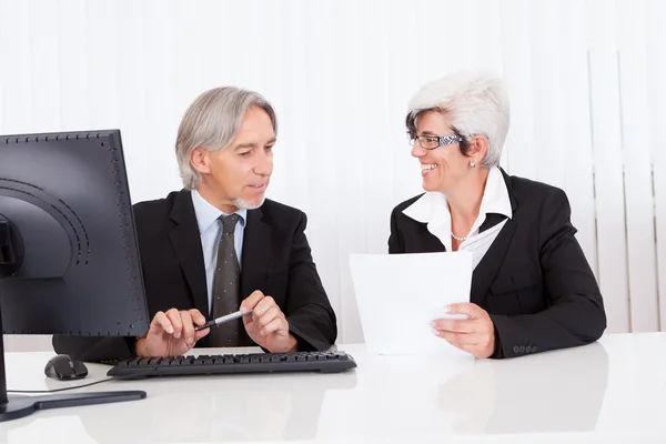 Senior partners at a business meeting — Stock Photo, Image