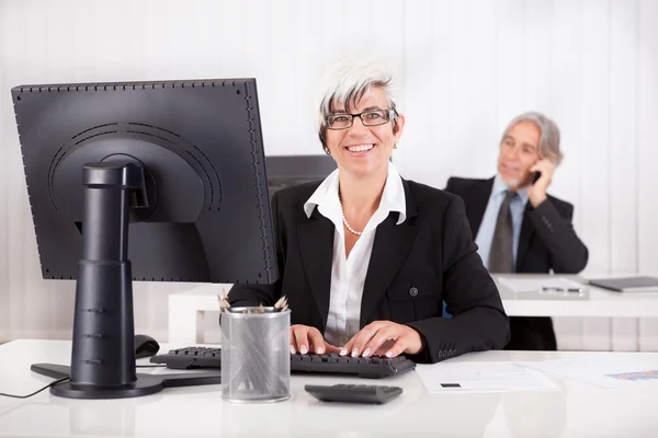 Smiling secretary or personal assistant — Stock Photo, Image