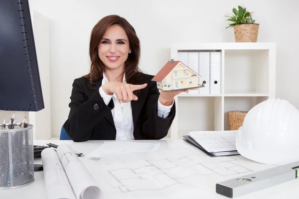 Businesswoman With Home Model — Stock Photo, Image