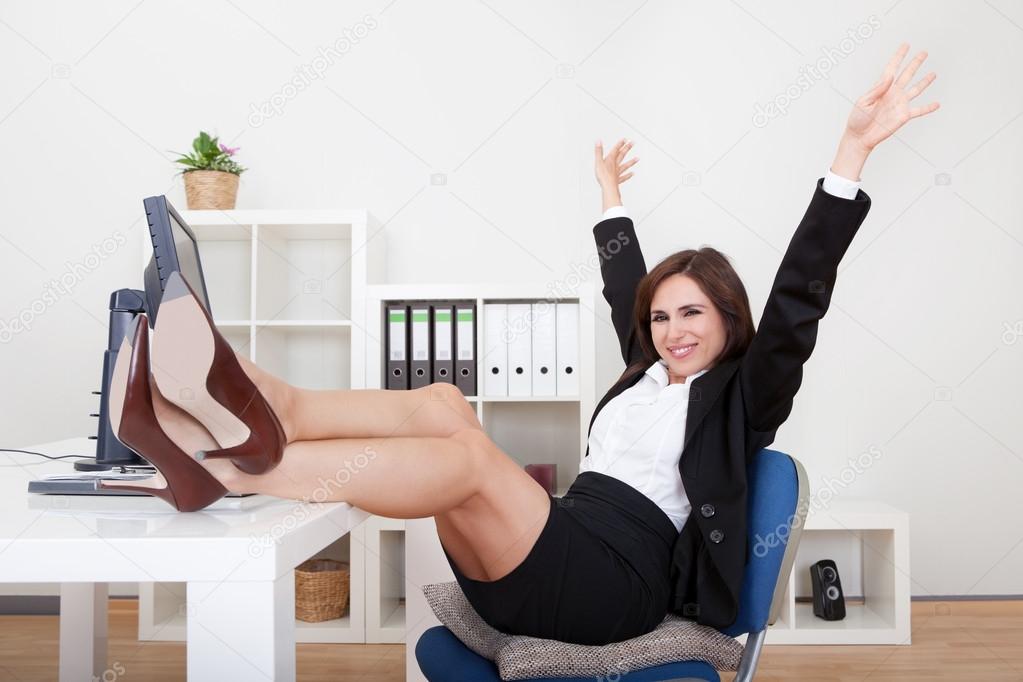 Young Businesswoman Relaxing In Office