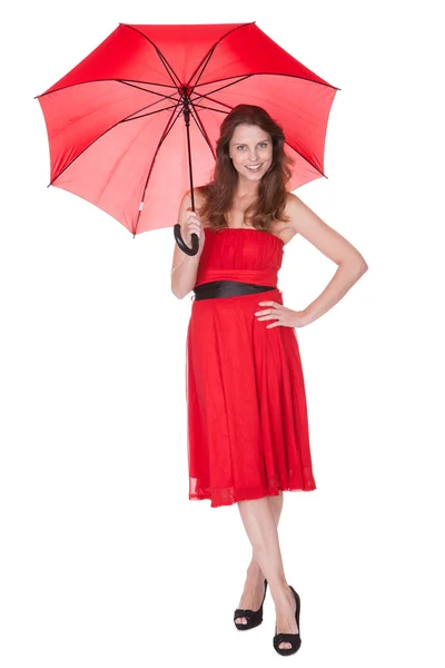 Femme avec parapluie rouge — Photo