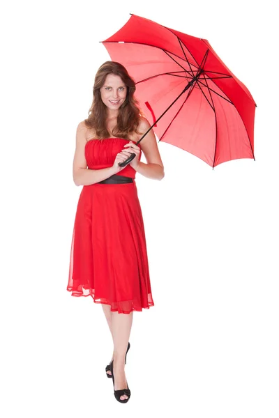 Mulher com guarda-chuva vermelho — Fotografia de Stock