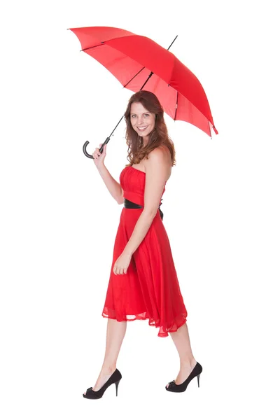 Mulher com guarda-chuva vermelho — Fotografia de Stock