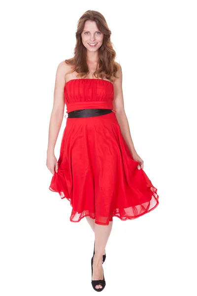 Femme glamour en robe rouge — Photo