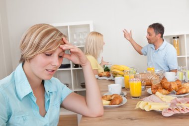 Parents arguing in the kitchen clipart