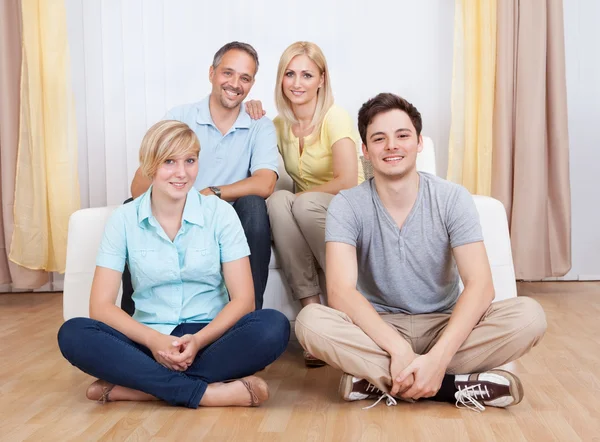 Smiling family in group portrait — Stock Photo, Image