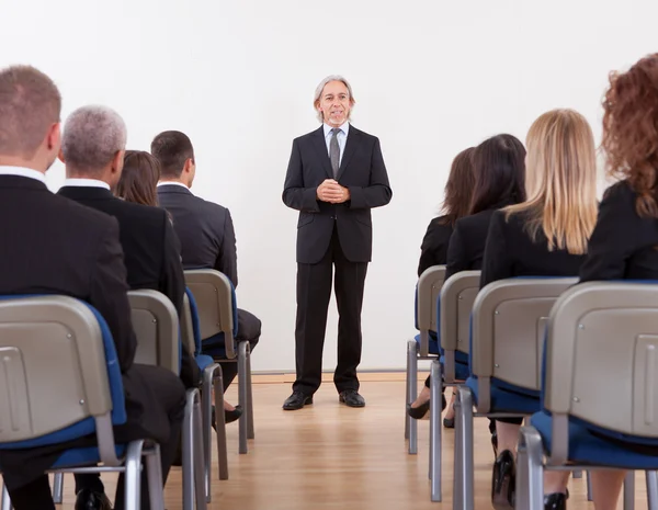 Portrait Of A Senior Manager Giving Presentation — Stock Photo, Image