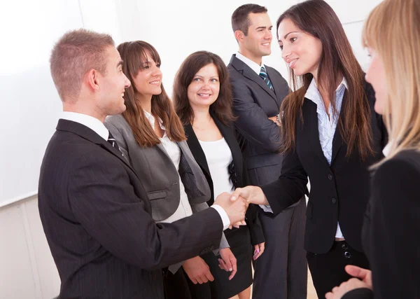 Businessman And Businesswoman Shaking Hands — Stock Photo, Image