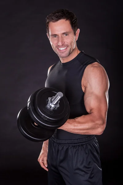 Young Attractive Man Pumping Weights — Stock Photo, Image