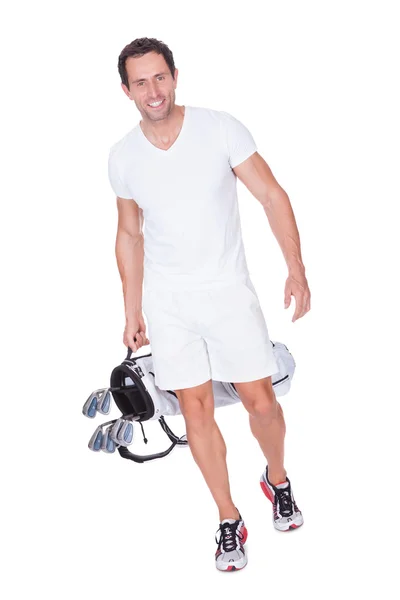 Golfspieler hält Tasche mit Schlägern in der Hand — Stockfoto