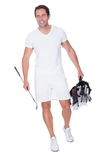 Golfspieler hält Tasche mit Schlägern in der Hand — Stockfoto