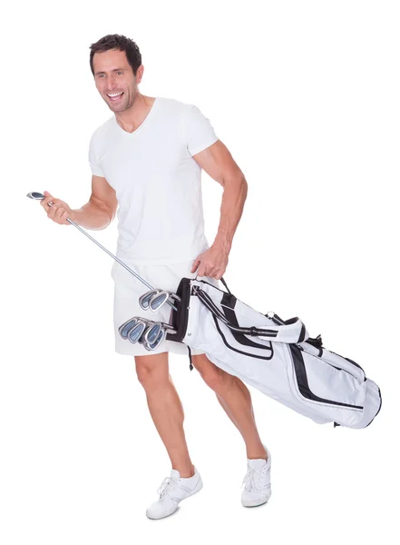 与俱乐部高尔夫球球员控股袋 — 图库照片
