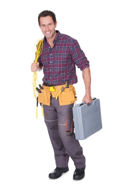 Elektricien man met kabel en toolbox — Stockfoto