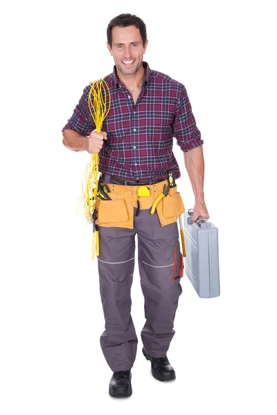 Elektricien man met kabel en toolbox — Stockfoto