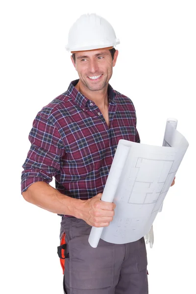 Young Man Showing Building Blueprint — Stock Photo, Image
