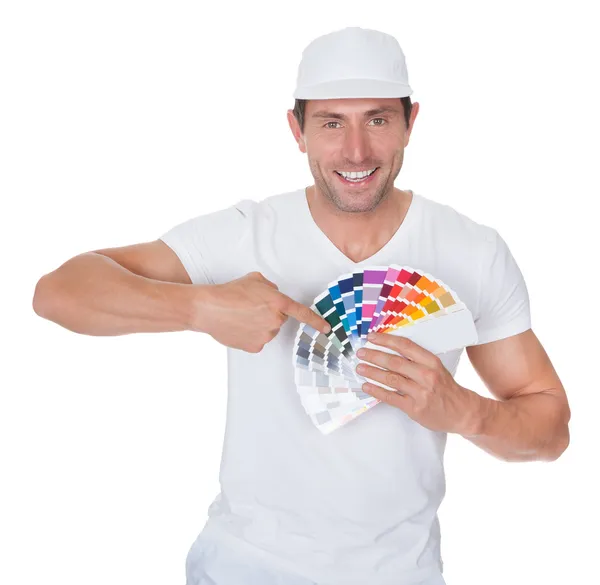 Painter Holding A Paint Roller And Spectrum — Stock Photo, Image